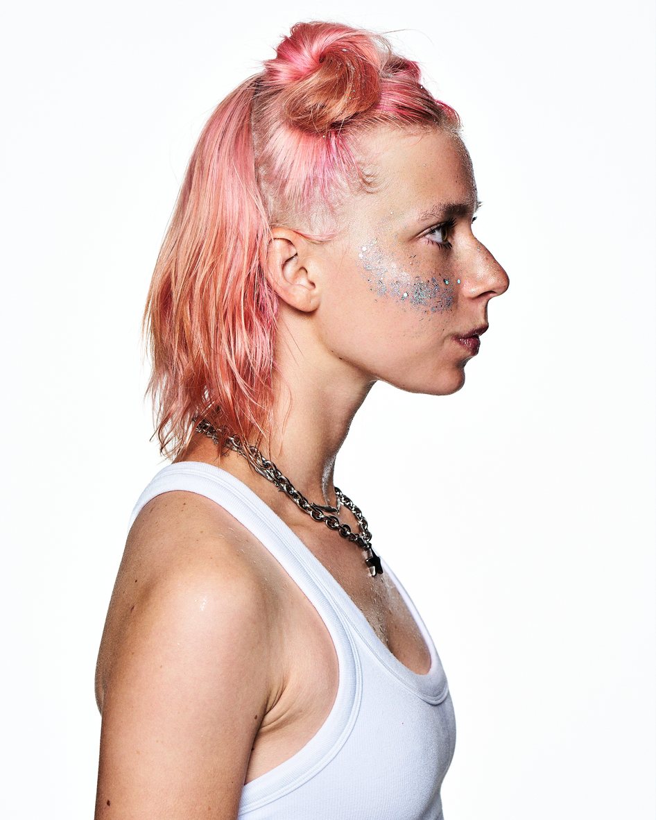 Silver glitter along the cheekbone, in profile
