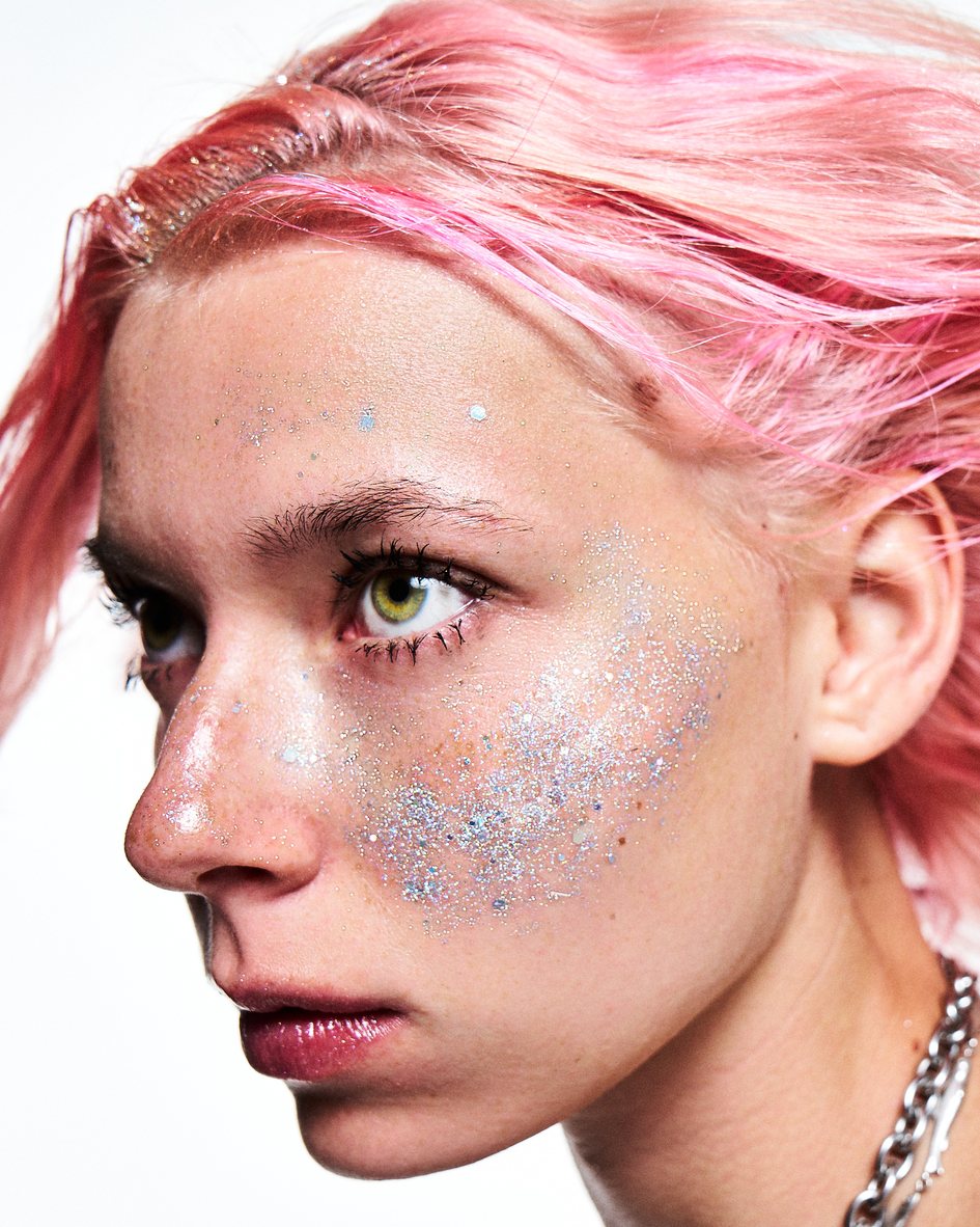 Silver glitter freckles under the eye